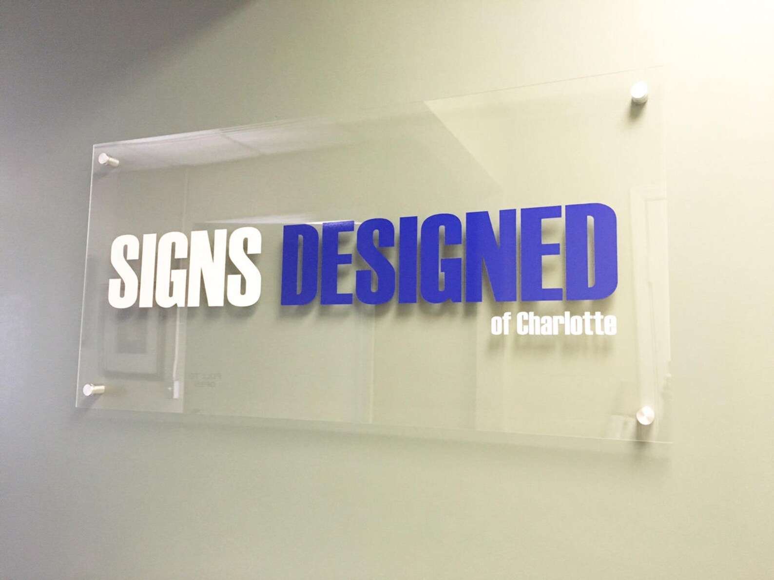 Acrylic Wall Sign Reception Dubai — Black Lion Sign